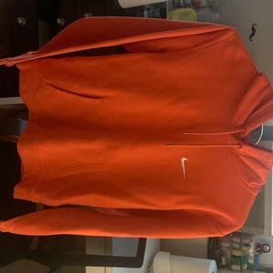 I’m selling an orange Nike hoodie, size medium!
